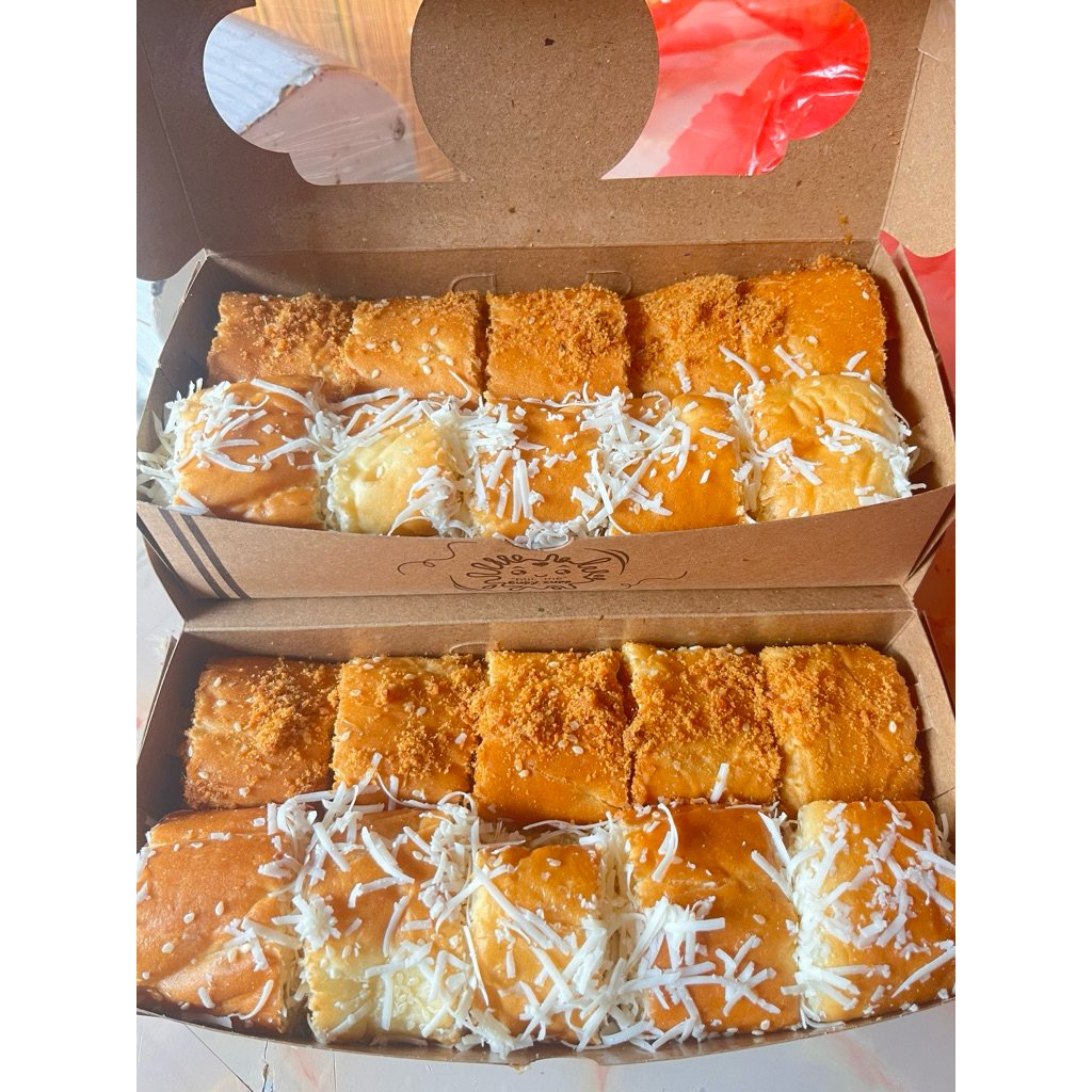 

roti gulung keju mini isi 10pcs (dalem isi keju lumer, luar keju serut)