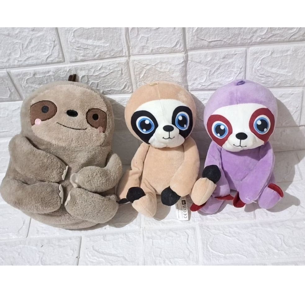 boneka kukang coklat ungu. boneka hewan binatang unik