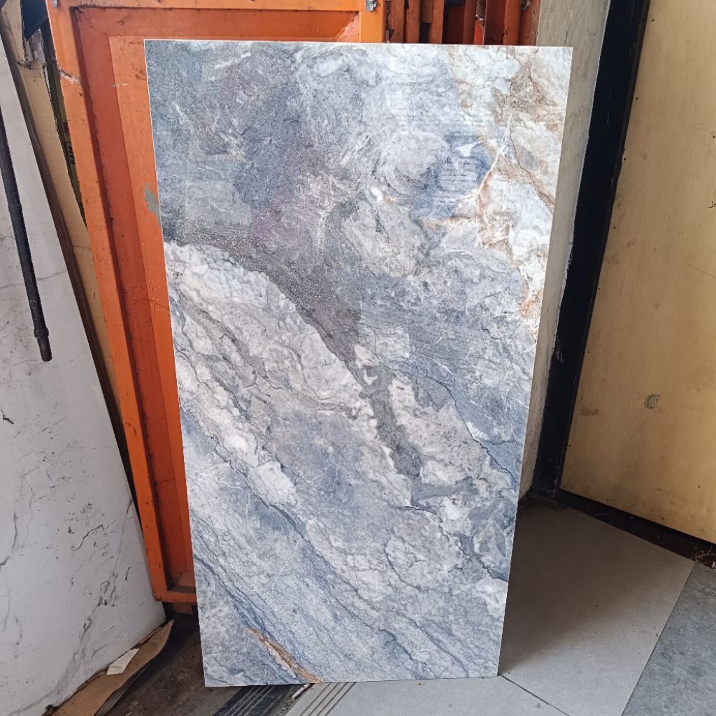 Granit lantai 60x120 motif marmer fasipik blue  ikad