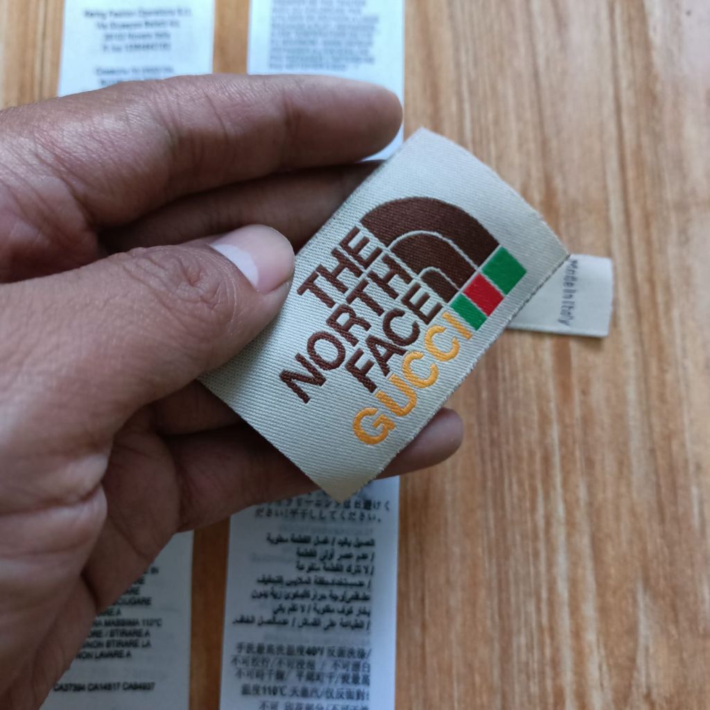 

tag label Gucci x Tnf