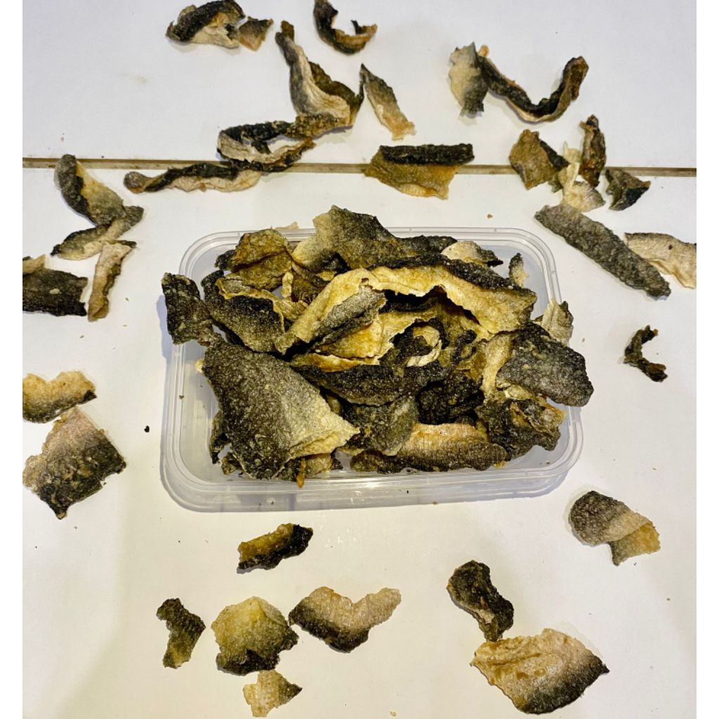 

KERUPUK KULIT IKAN PATIN 500ML / KERUPUK PATIN