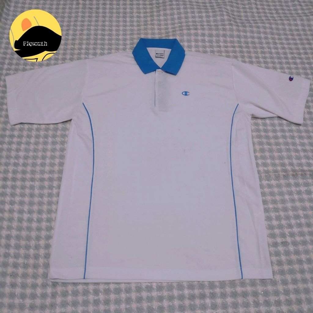 kaos polo champion putih size L