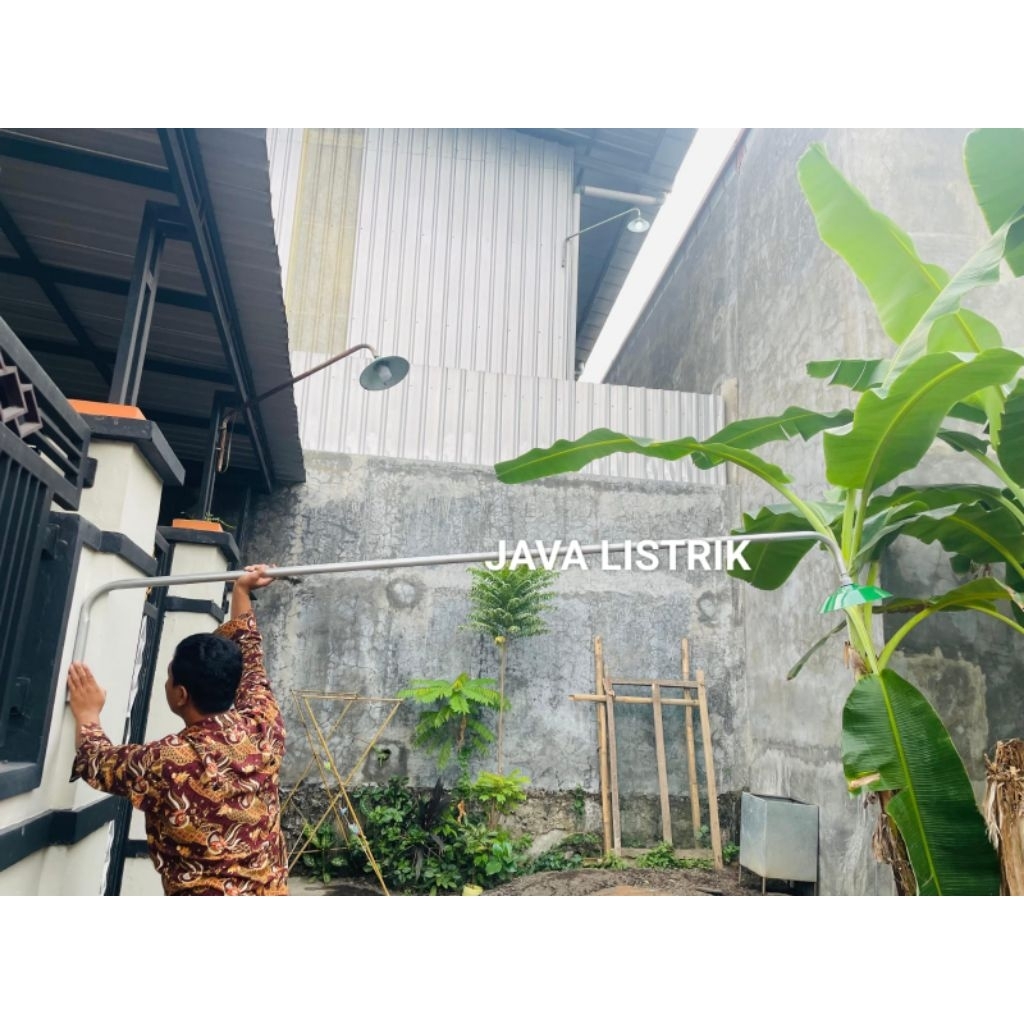 Tiang lampu pju / tiang lampu beton listrik