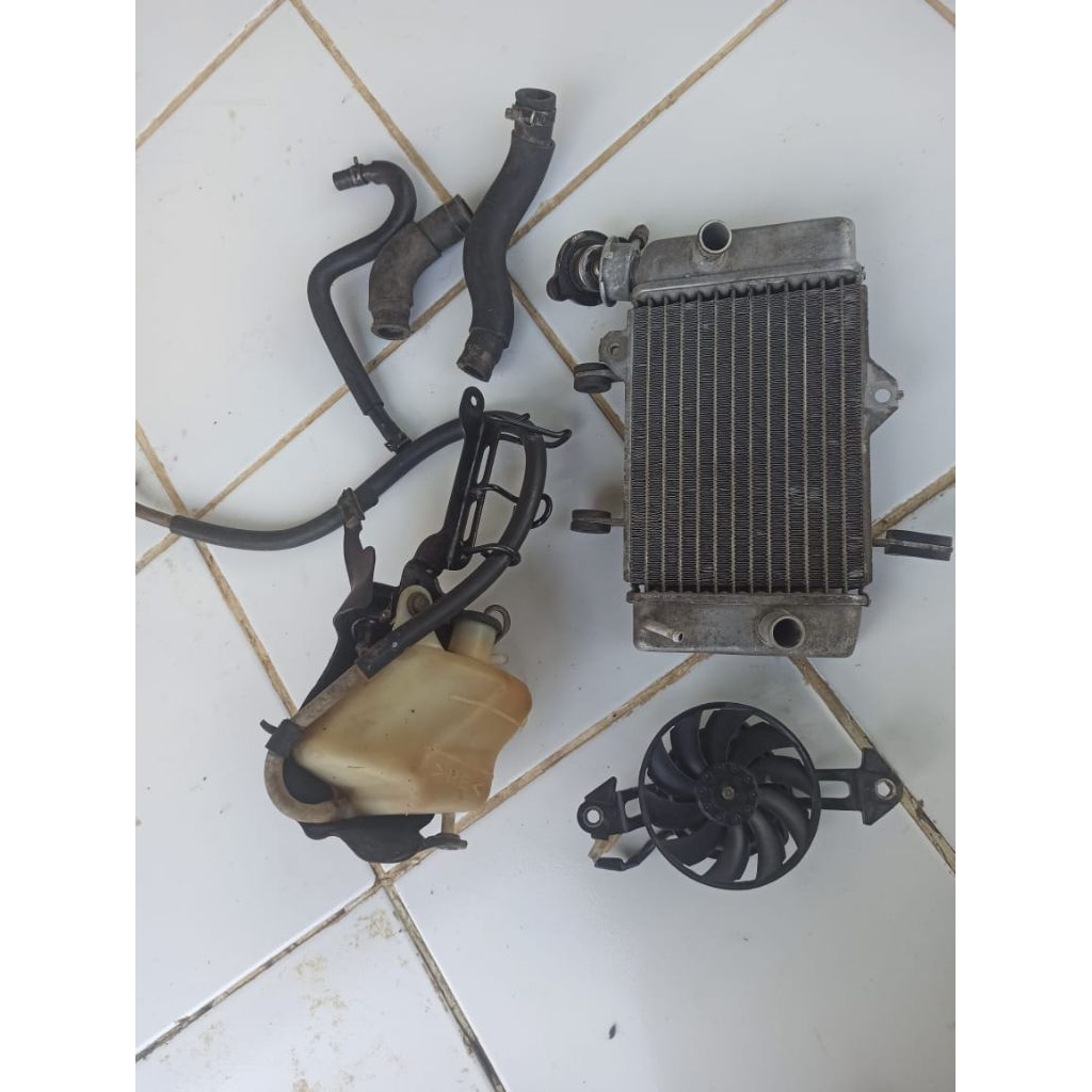 1 set radiator ori copotan mx 135