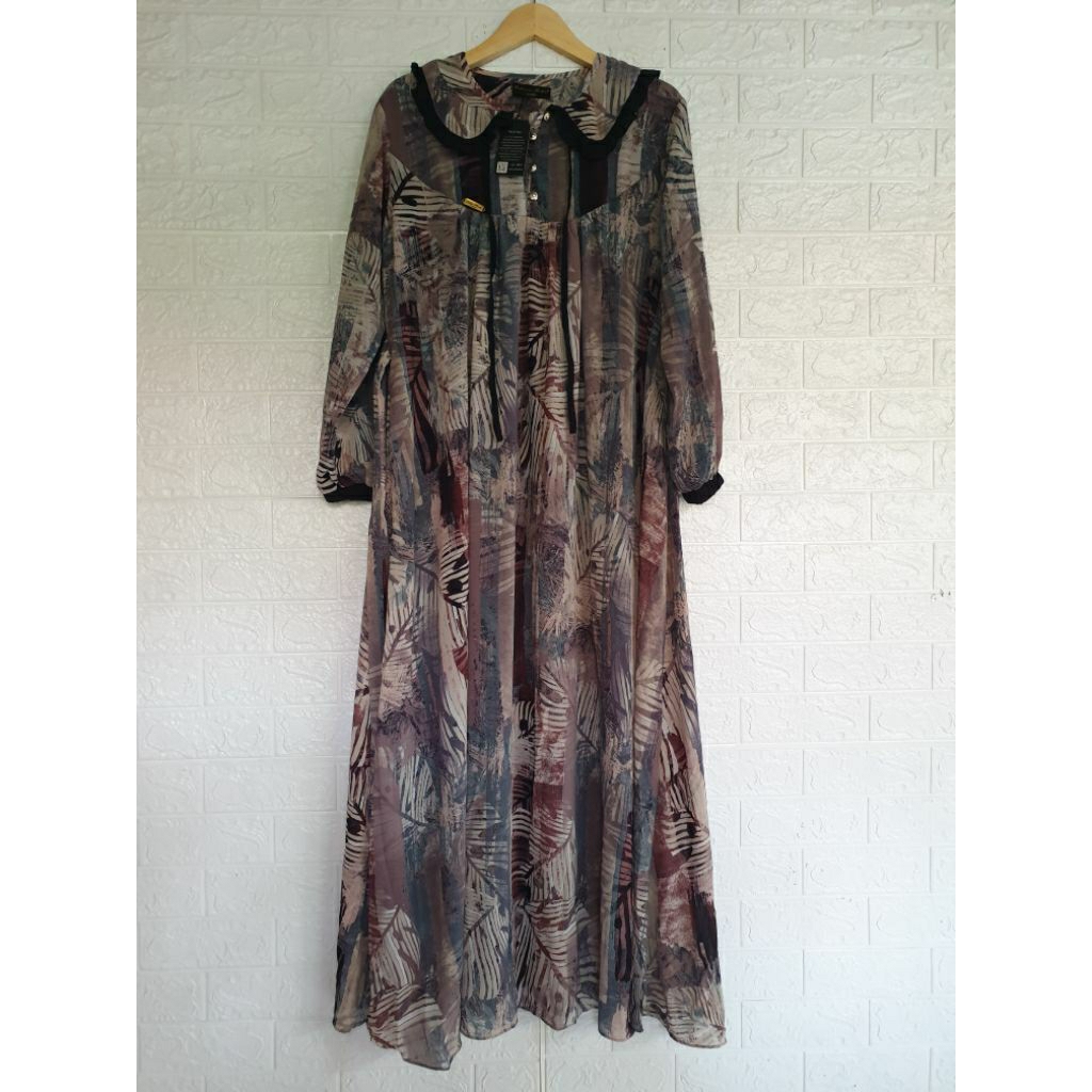 zeline mode gamis abstrak