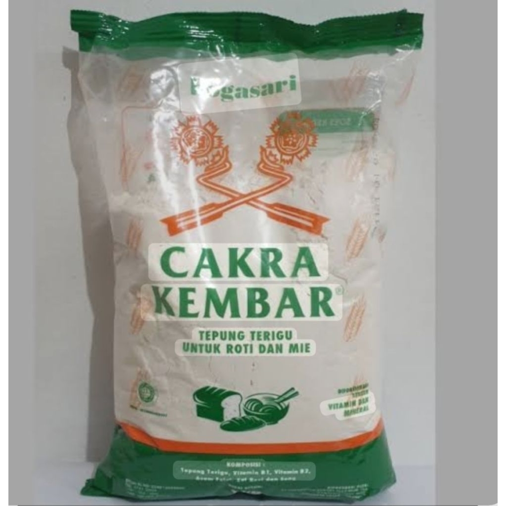 

1 DUS Tepung terigu cakra kembar Bogasari kemasan 1 kg (isi 12)