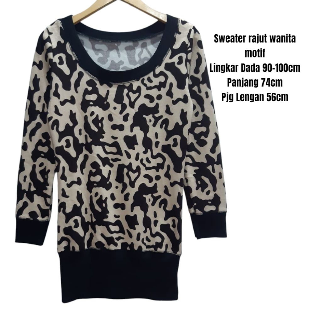 Sweater rajut wanita motif