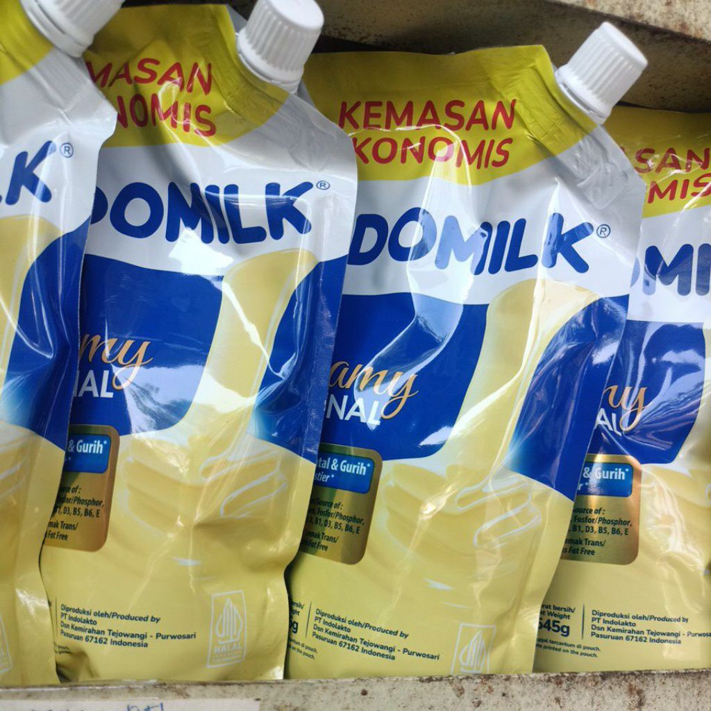 

Indomilk Susu Kental Manis 545g Pouch Refil Tutup Ulir