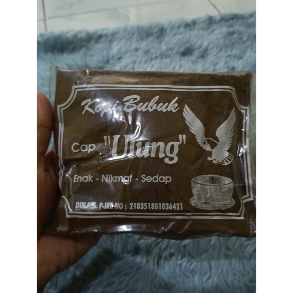 

Kopi bubuk hitam cap ULUNG