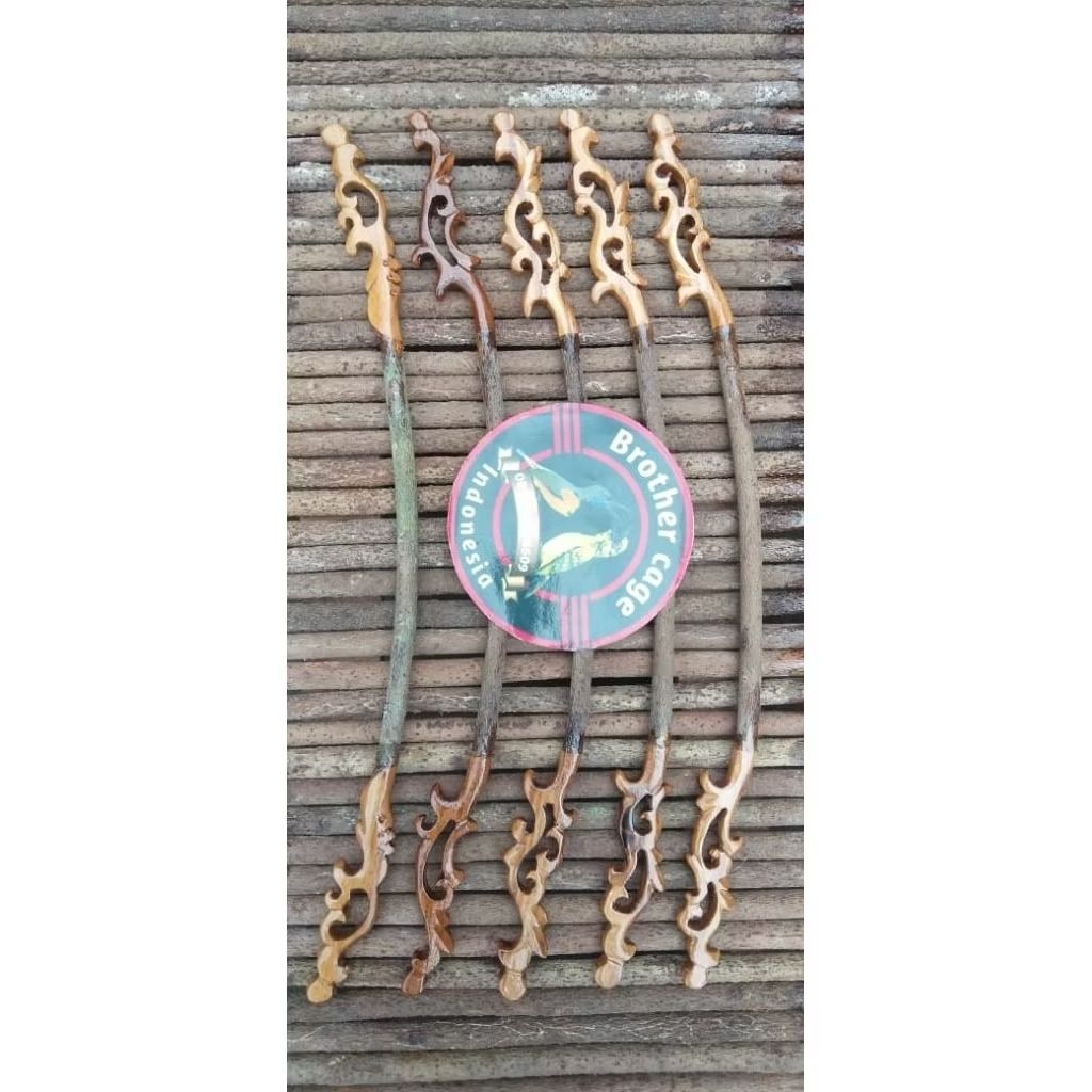 tangkringan pleci heloped lengkung ukir asem Bali