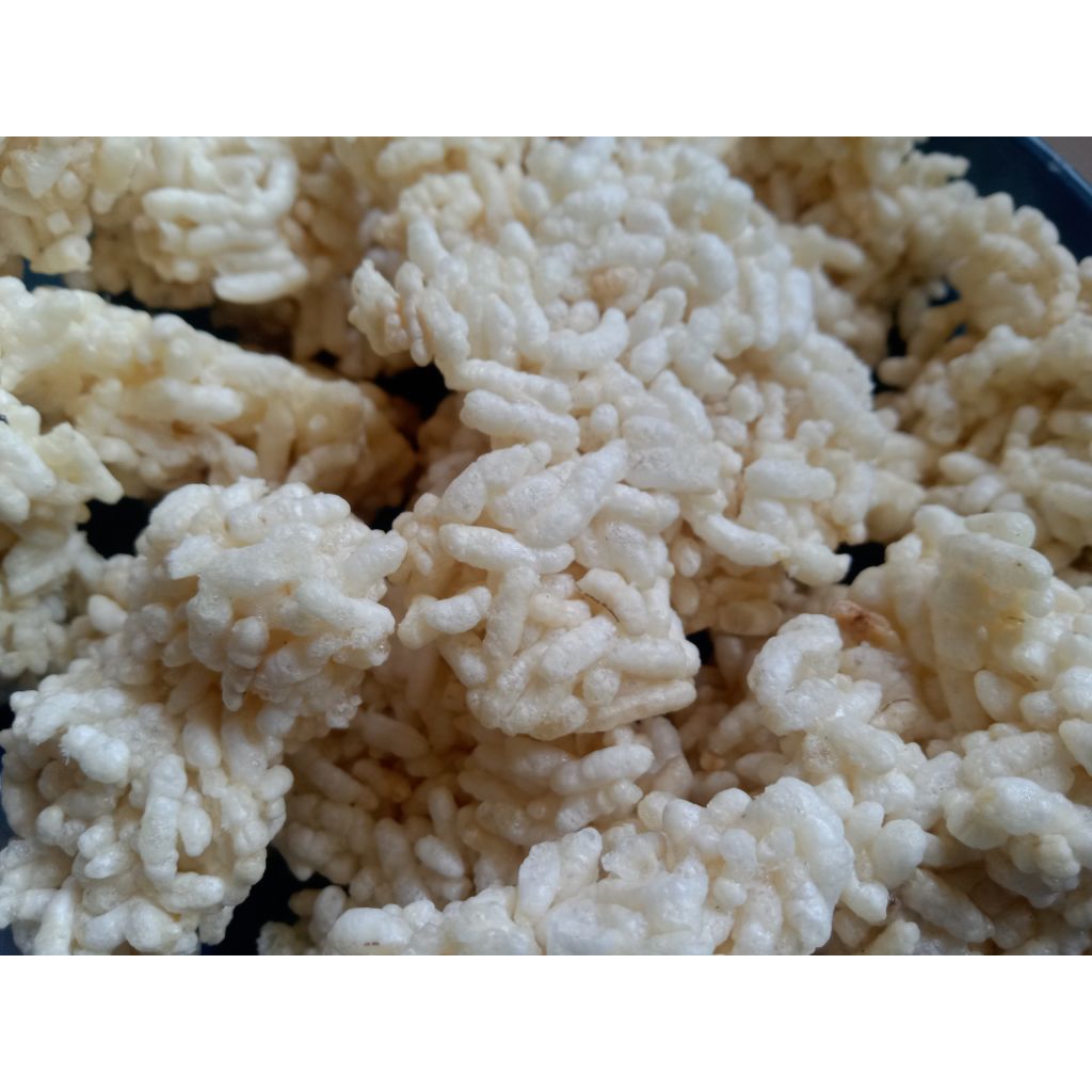 

jimpitan jumputan beras ketan