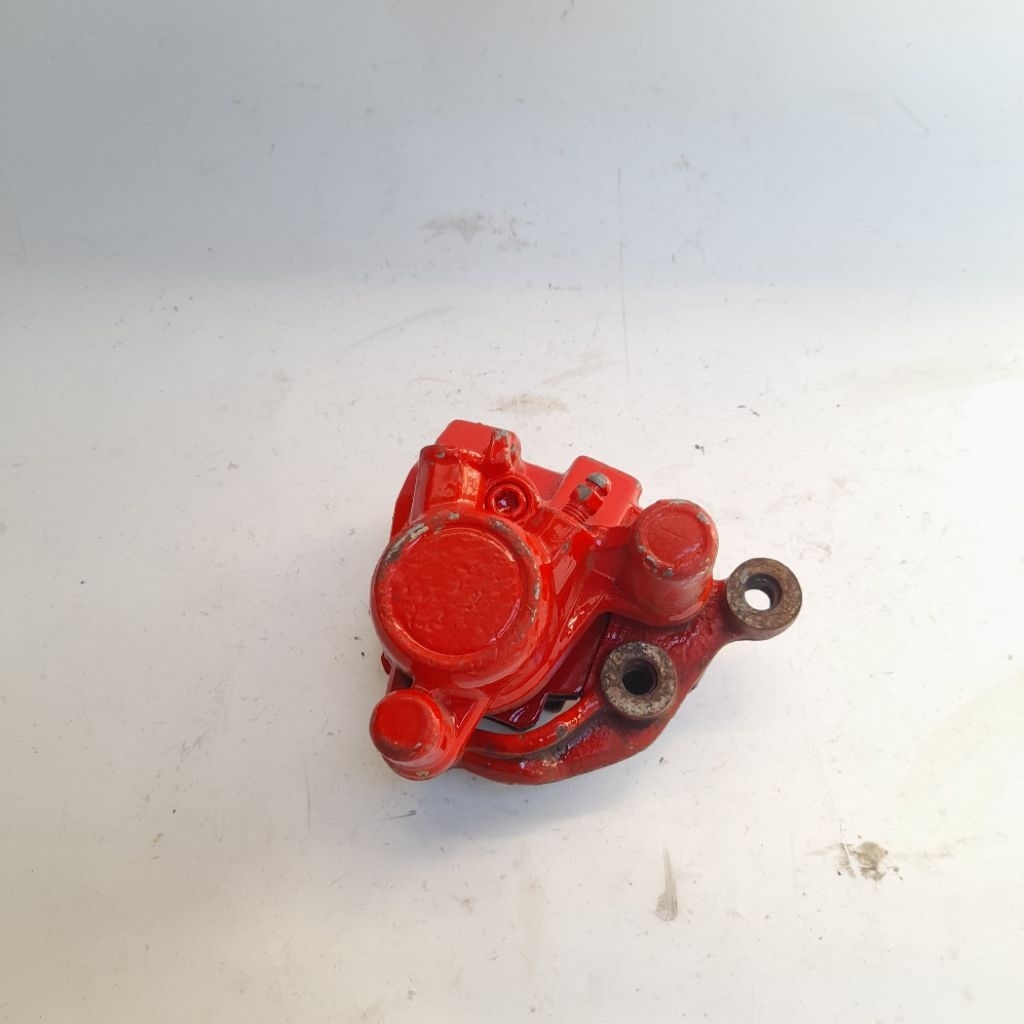 kaliper rem bawah depan RX King Cobra piston 1 satu original