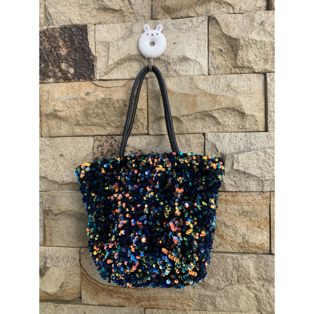 tas manik mote mote tas pesta