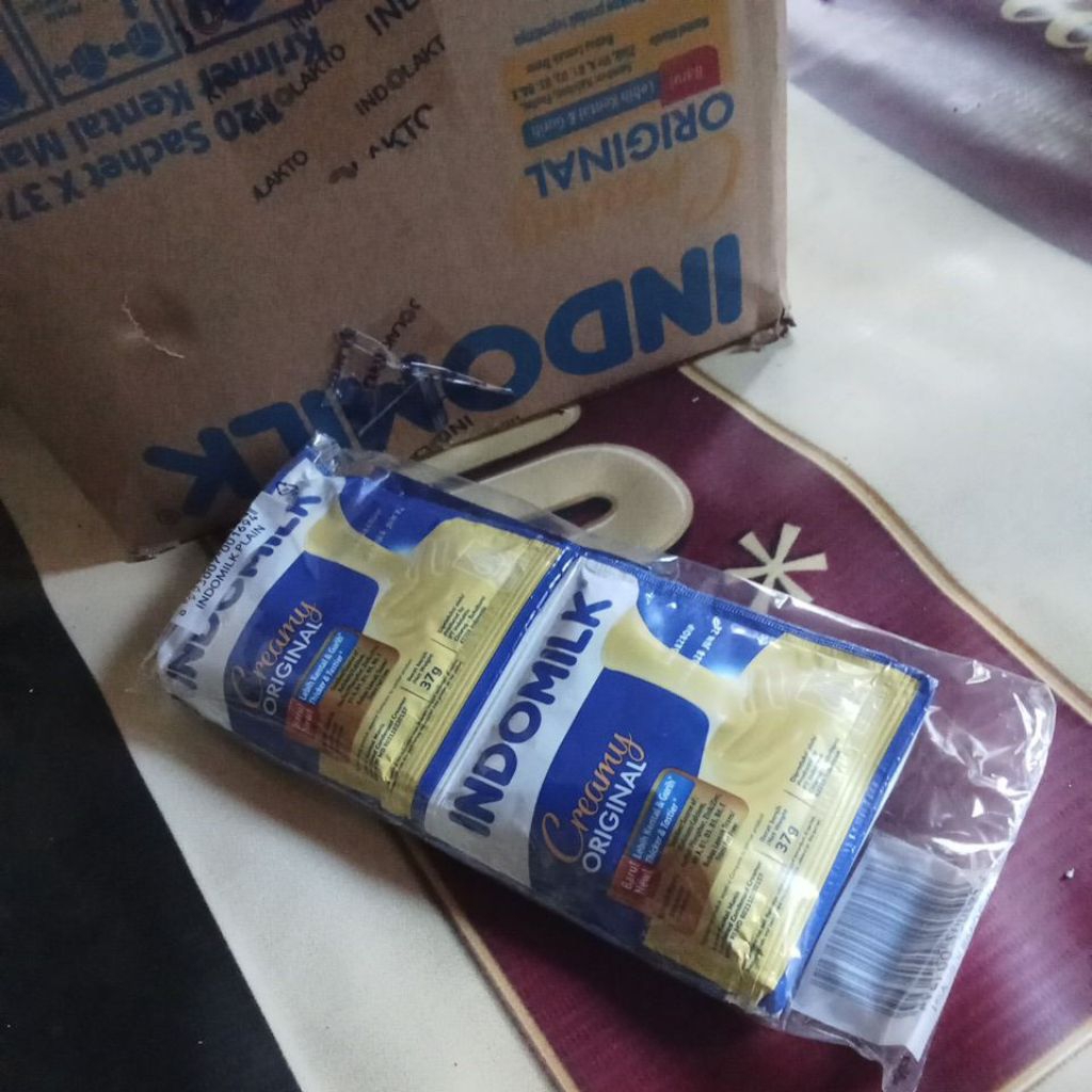 

susu INDOMILK shacet