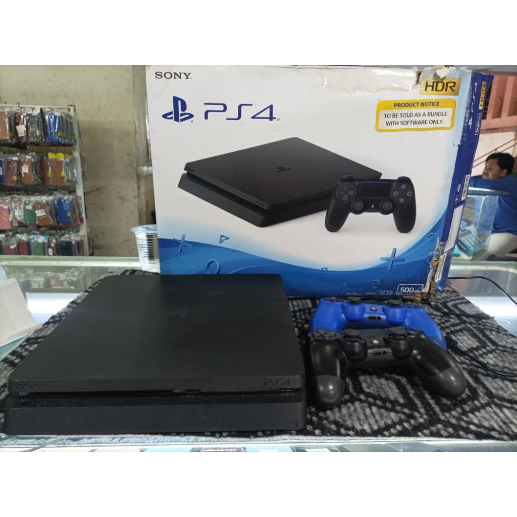 PS 4 slim 500 GB seri 2218A (region indo) resmi,kelengkapan stick 2 dus ori (buku petunjuk dll ada).