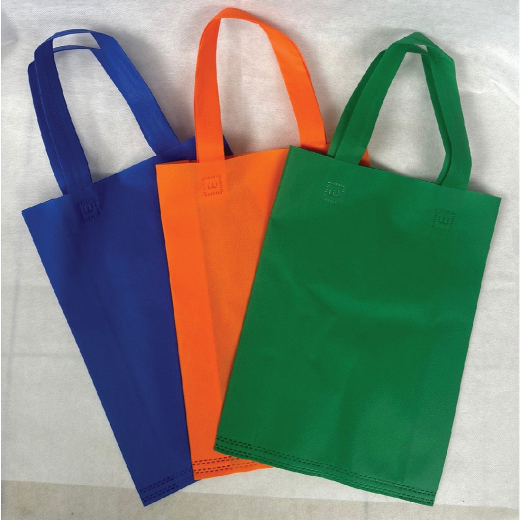 

Tas/Goodie bag Spunbond TIpe HLS sablon gold + 1 warna, 1 sisi