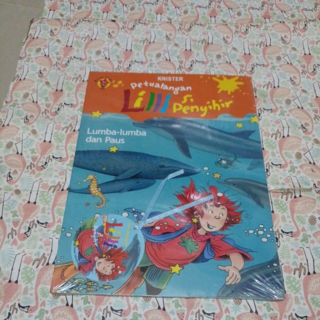 Cerita Petualangan Lilli si penyihir - lumba lumba dan paus