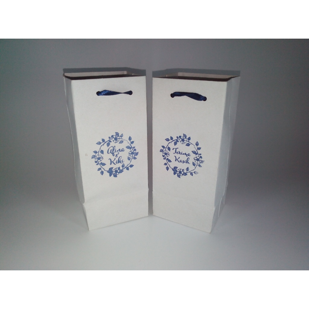 

Paperbag kraft putih ukuran custom 1
