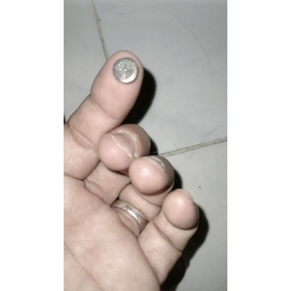 koin perak kerajaan Sriwijaya