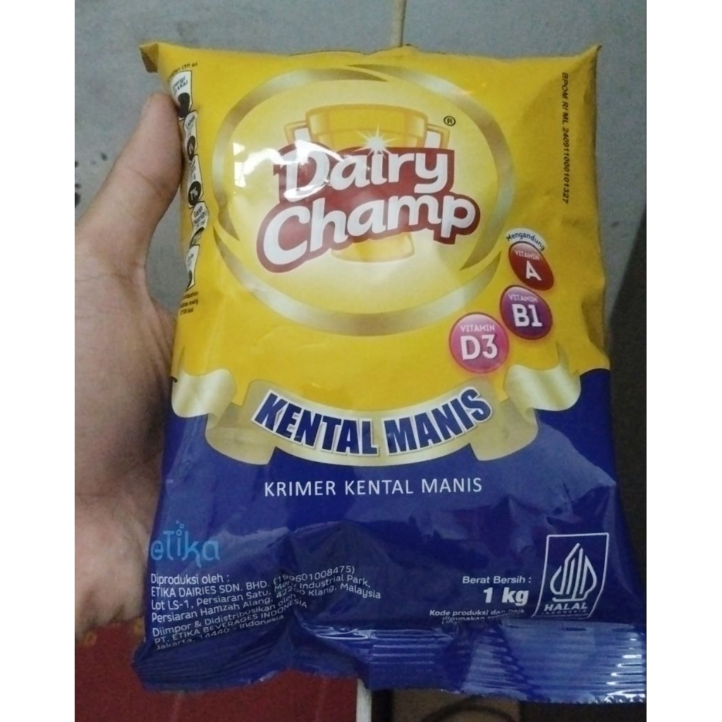 

Susu Krimer Kental Manis SKM Dairy Champ bantal 1kg