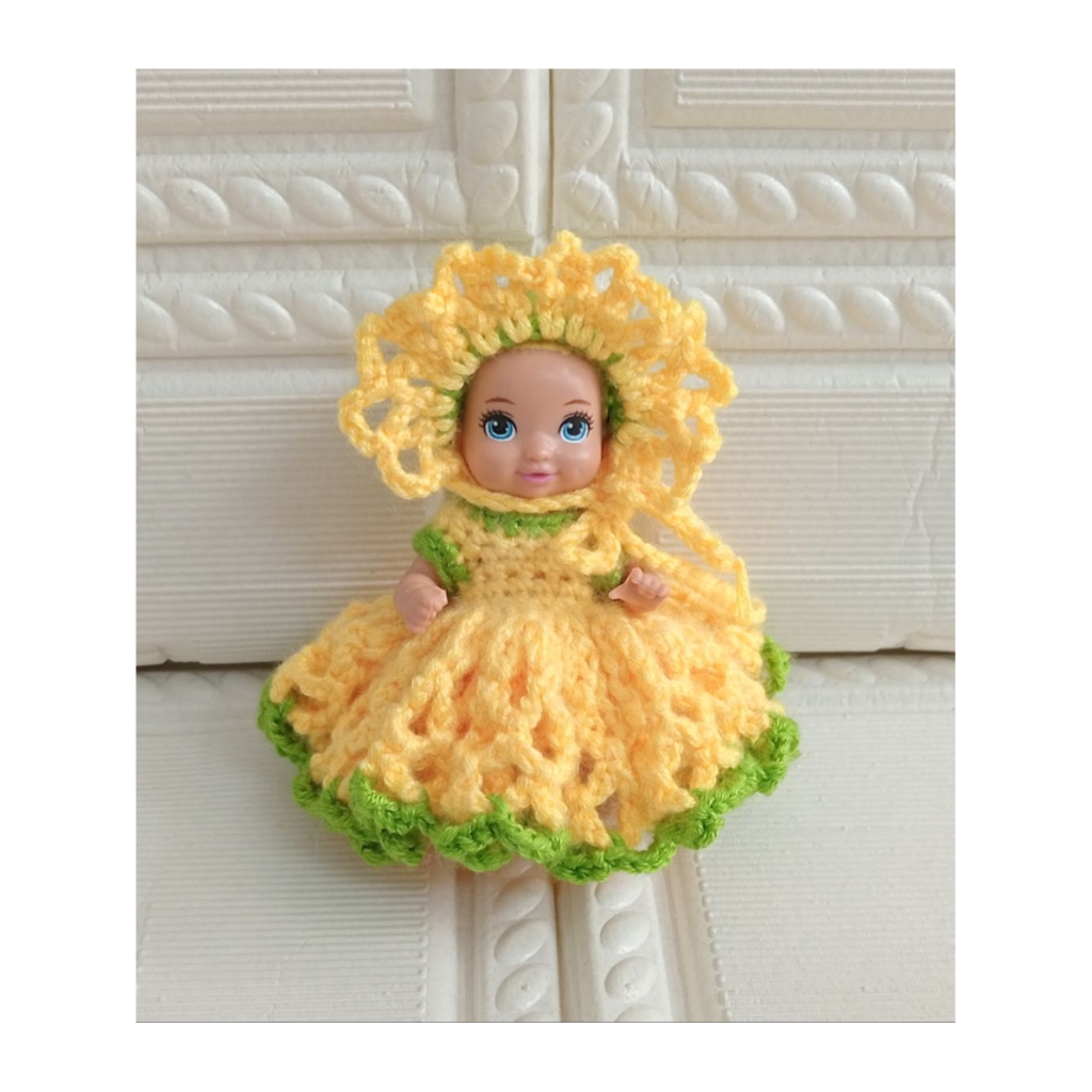 Baju boneka bayi rajut