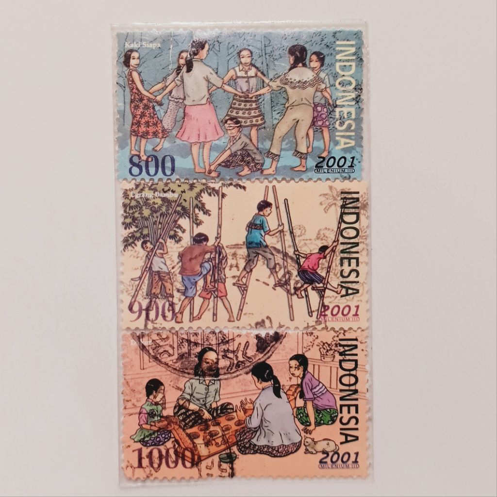 

(AC) Perangko Indonesia 2001 Permainan Anak Tradisional Set 3 pcs Used