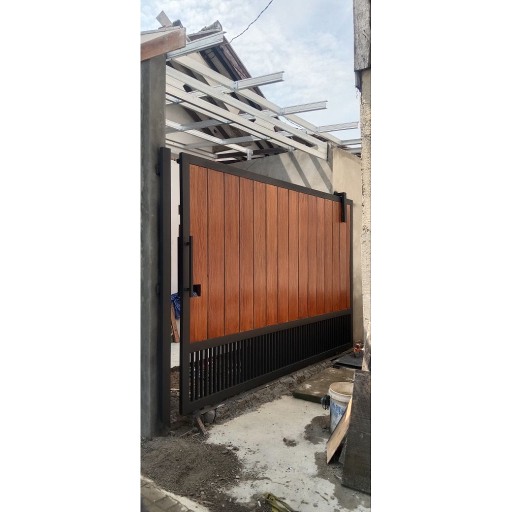 pagar besi motif kayu atau serat kayu lisplang grc