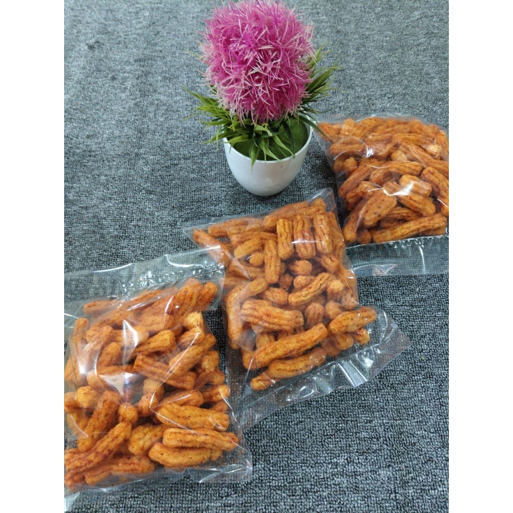 

Kerupuk Akar / Kerupuk Jaat pedas 130gram sncak ringan