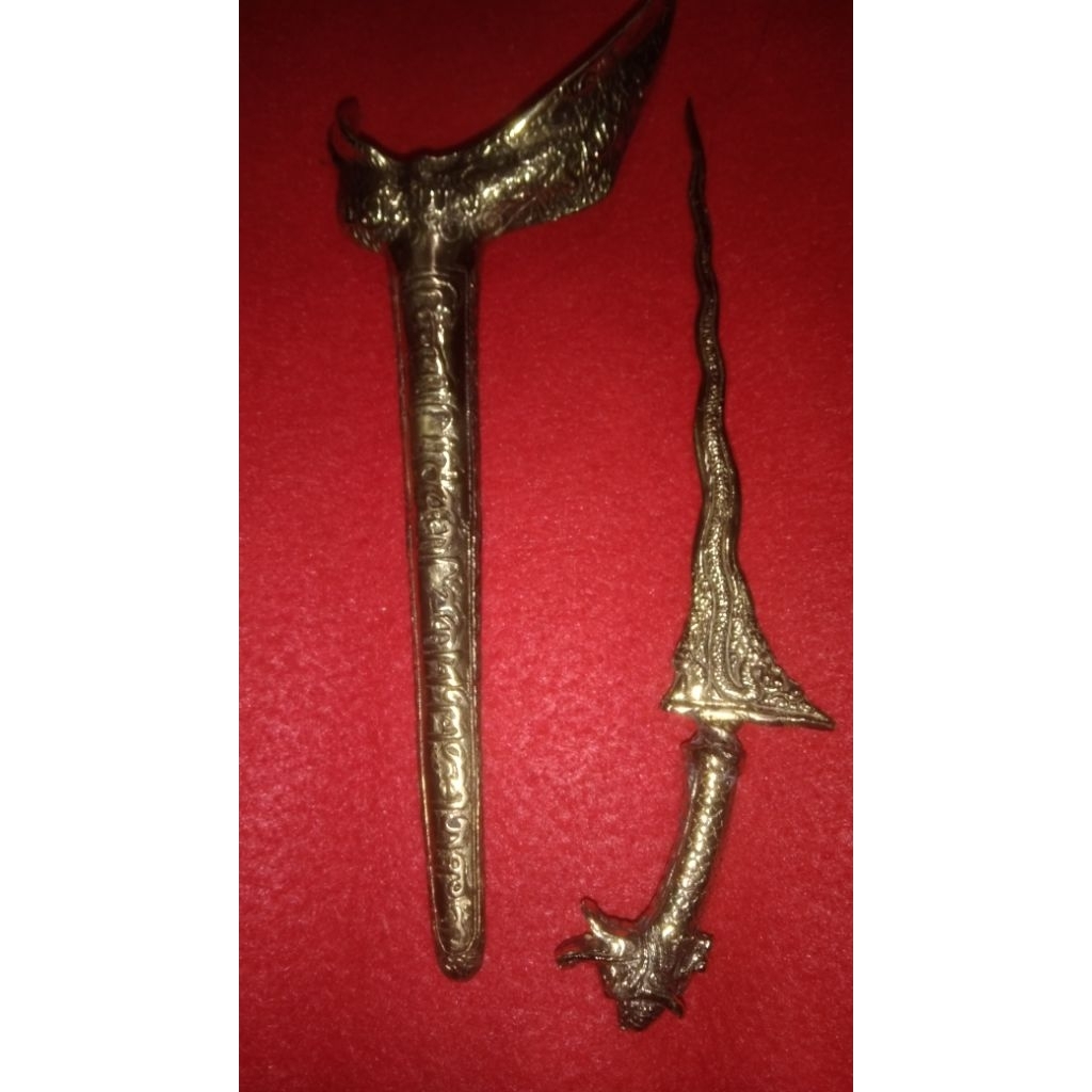 keris naga kuningan sari