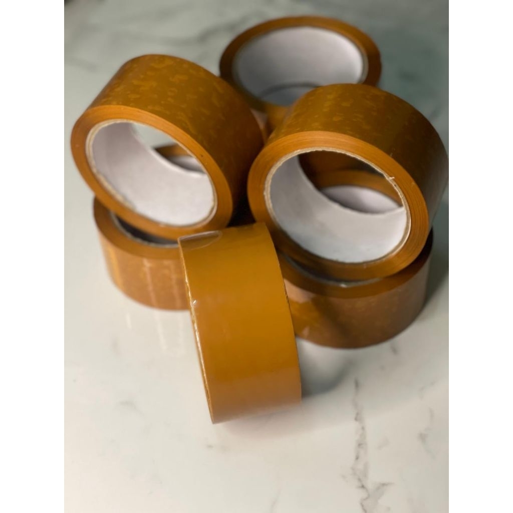 

LAKBAN COKLAT, LAKBAN KARDUS , PACKING BARANG 45mm*90 YARD ECO
