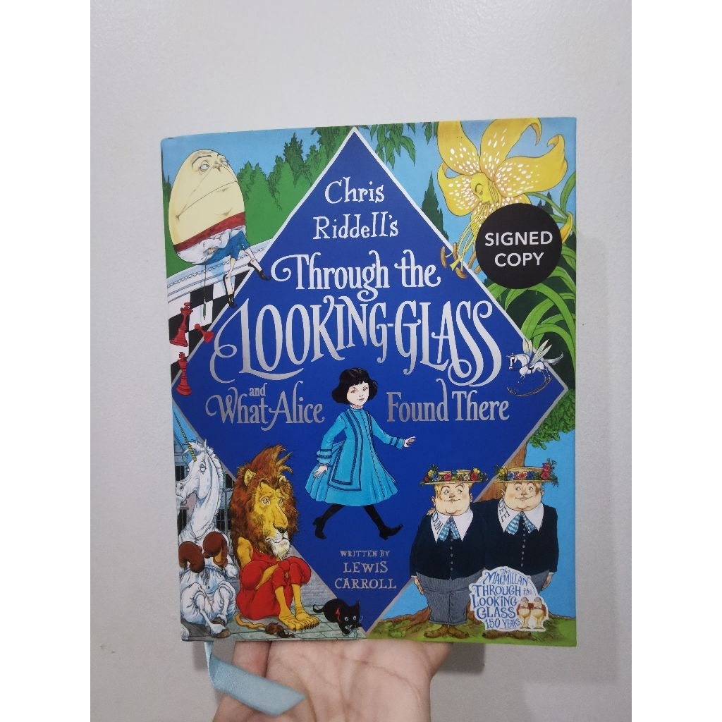 buku alice looking glass signed copy