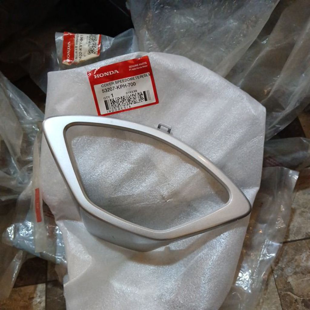 53207 KPH 700 GARNISH LIST SPEEDOMETER SUPRA X125 SILVER ORIGINAL AHM