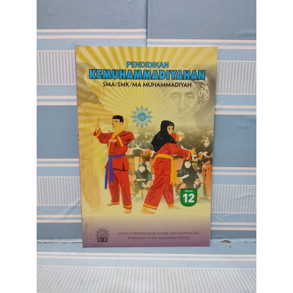 Buku pendidikan kemuhammadiyahan untuk SMA/SMK muhammadiyah kelas 3 XII 12