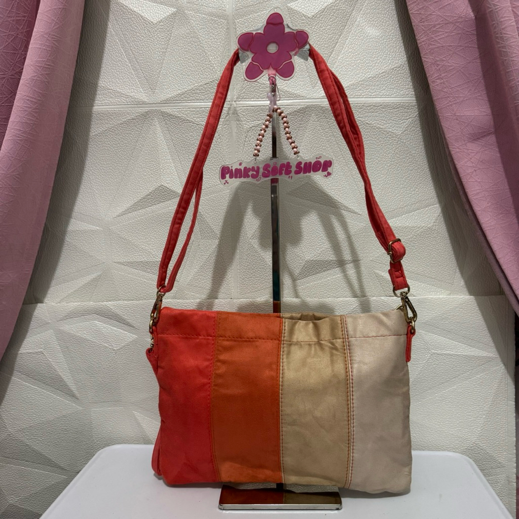 tas sling bag. tas selempang bludru. tas orange