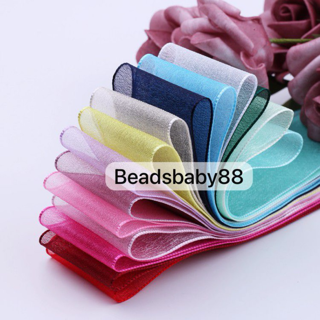 

Pita Organza Shimmer Mengkilat elegant (10yard) size 0,6cm 1,6cm 2,5cm dan 3,8cm Premium Quality bahan best quality super lembut cocok untuk dibuat jepit rambut anak, acc fashion lain atau bahan untuk buat bunga