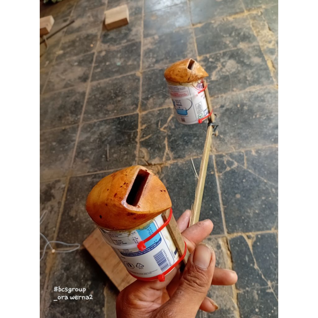 sawangan/orongan/sendaren layangan kaleng susu beruang