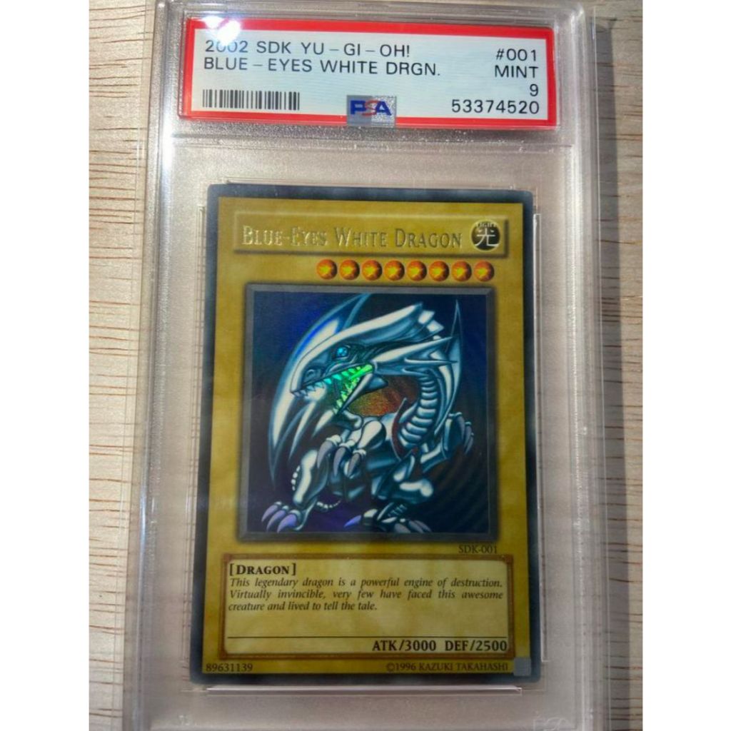 Kartu Graded Yugioh SDK NA Blue Eyes White Dragon PSA 9