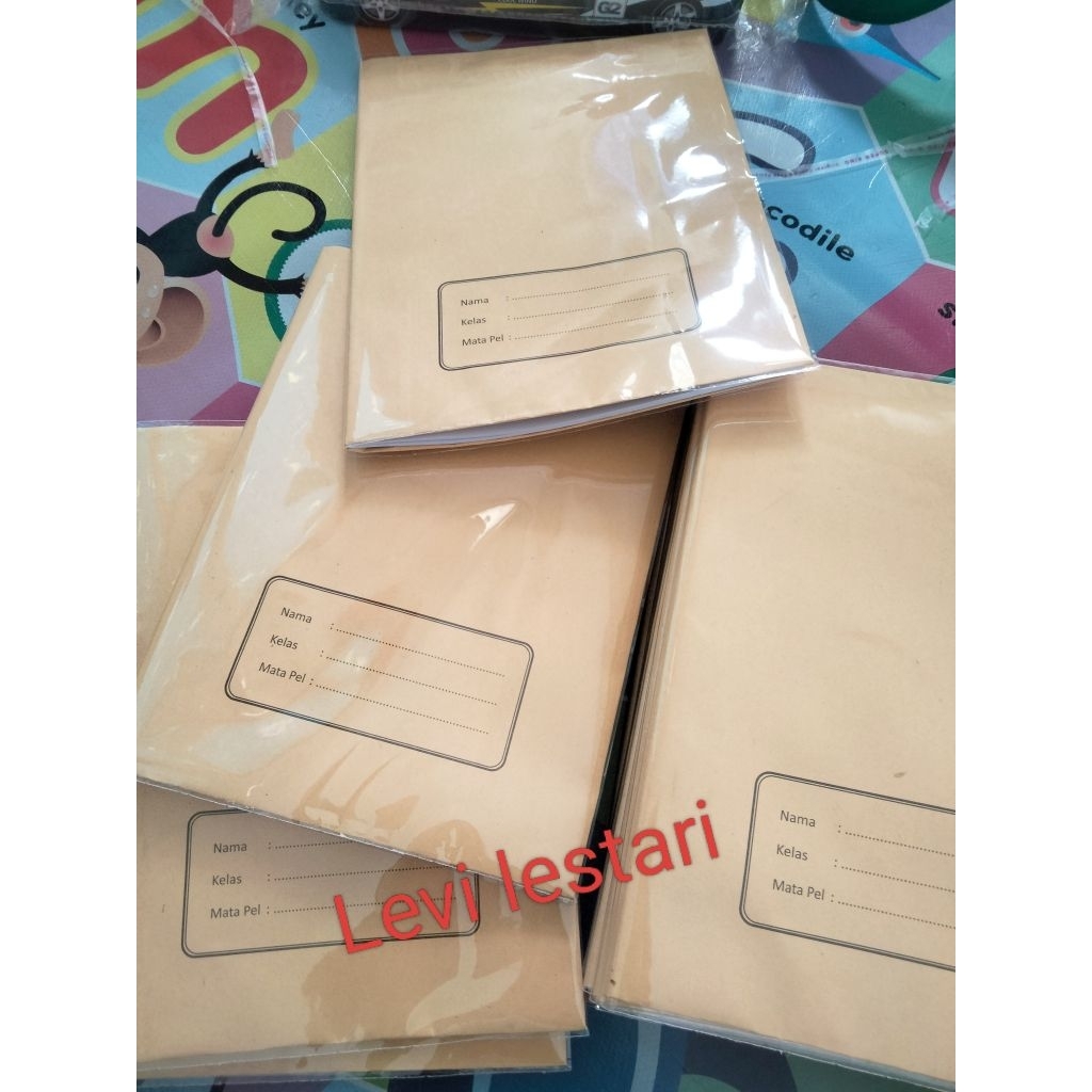 

Buku SIDU isi 38 sudah disampul coklat dan plastik