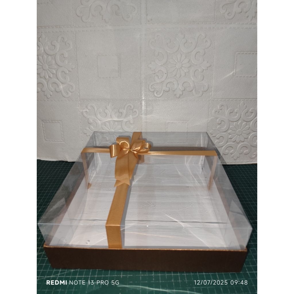 

kotakkuecoklatsedang