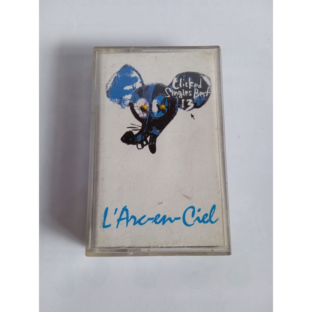 Kaset L'Arc~en~Ciel Laruku CLICKED SINGLES BEST 13