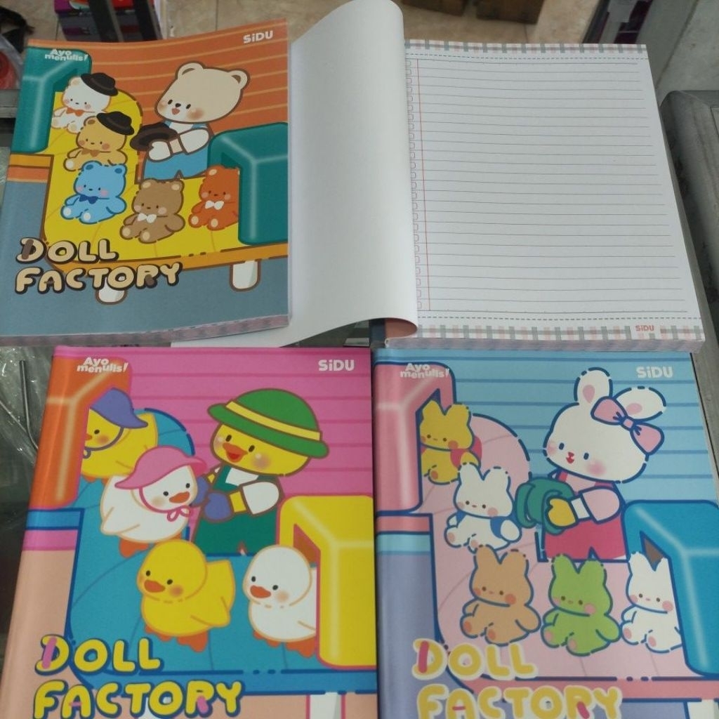 

Buku tulis sidu isi + cover : 100 lembar bercorak satuan