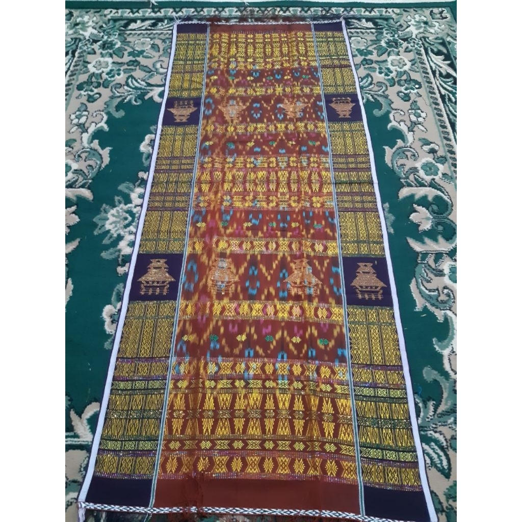 Uis Nipes Karo Sutra Kopi Gosong Rumah Adat