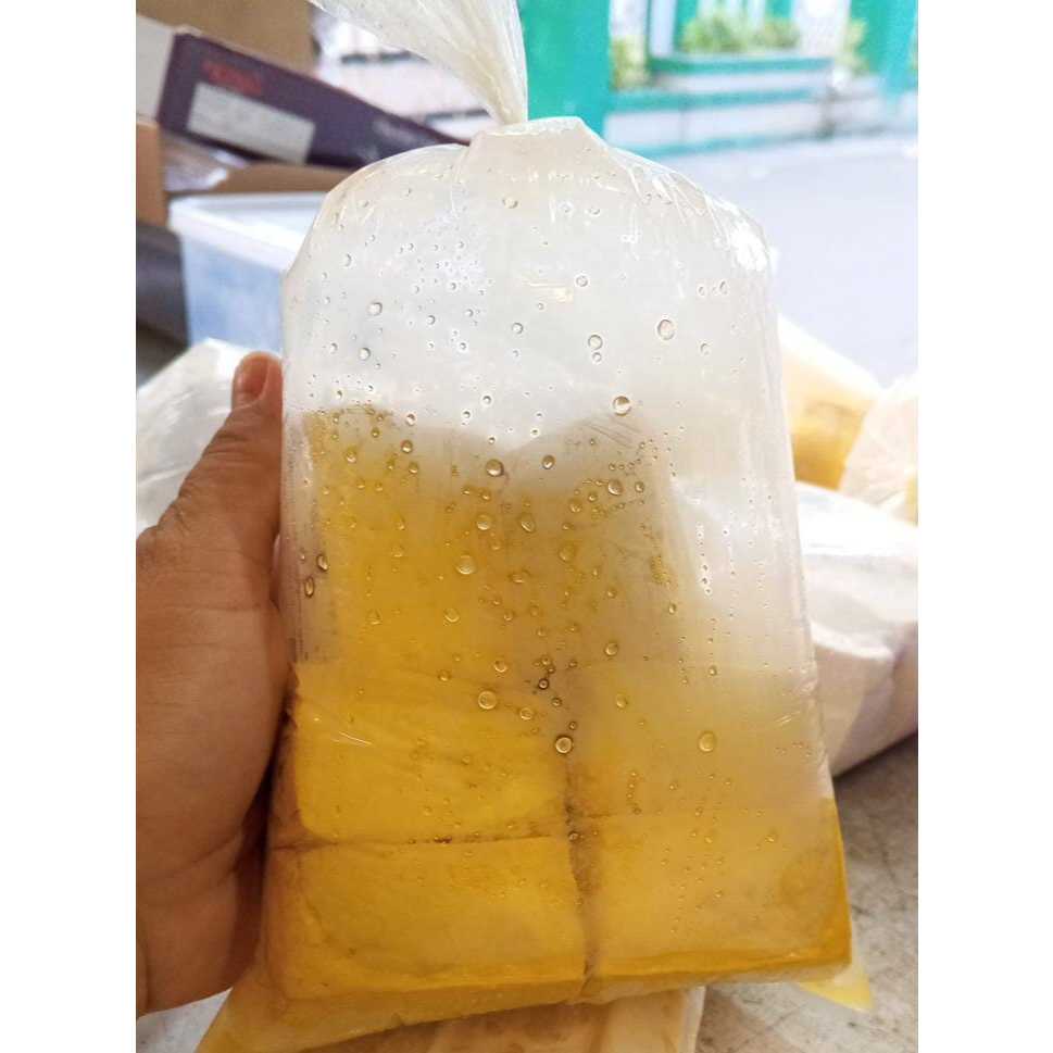 

Tahu Mentah Kuning Siap Goreng