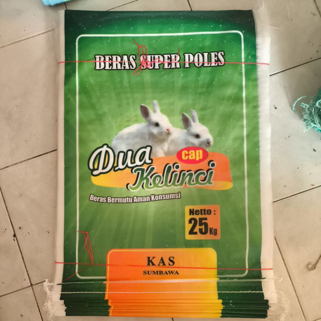 karung beras laminasi 25 KG ( cap dua kelinci )