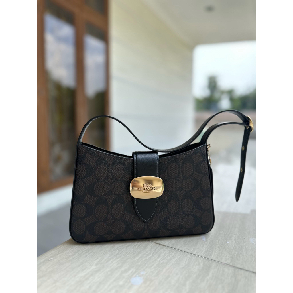 Coach Eliza shoulder bag in signature canvas brown black