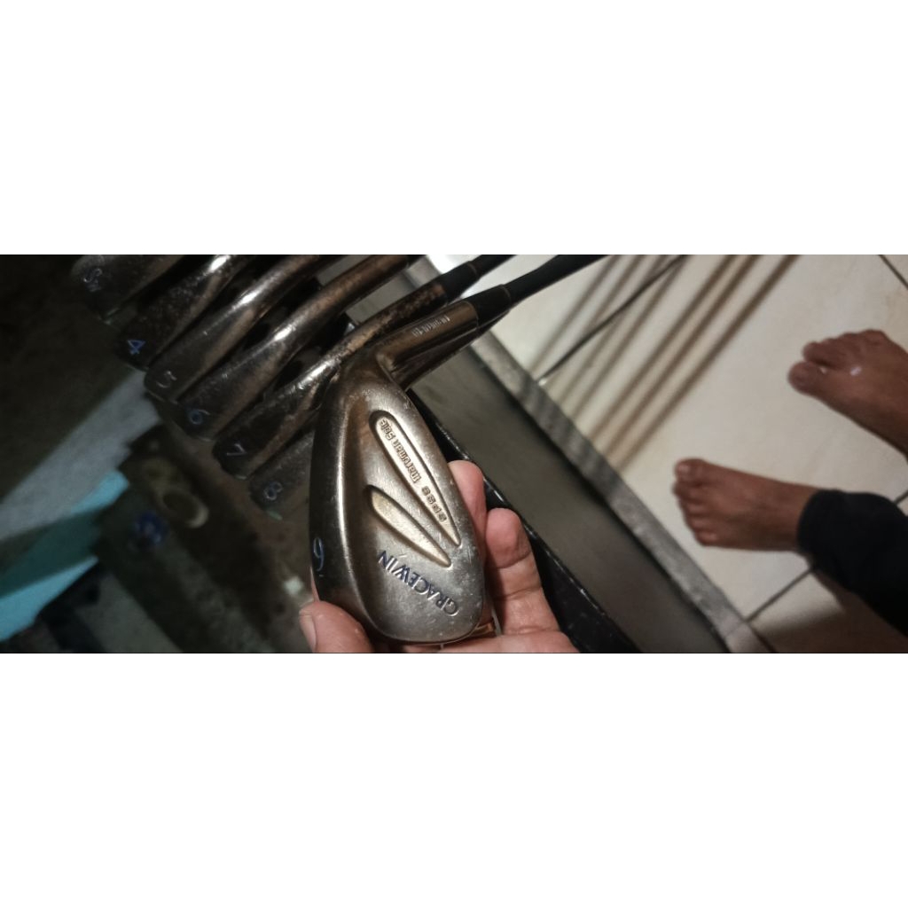 Stick golf ironset maruman