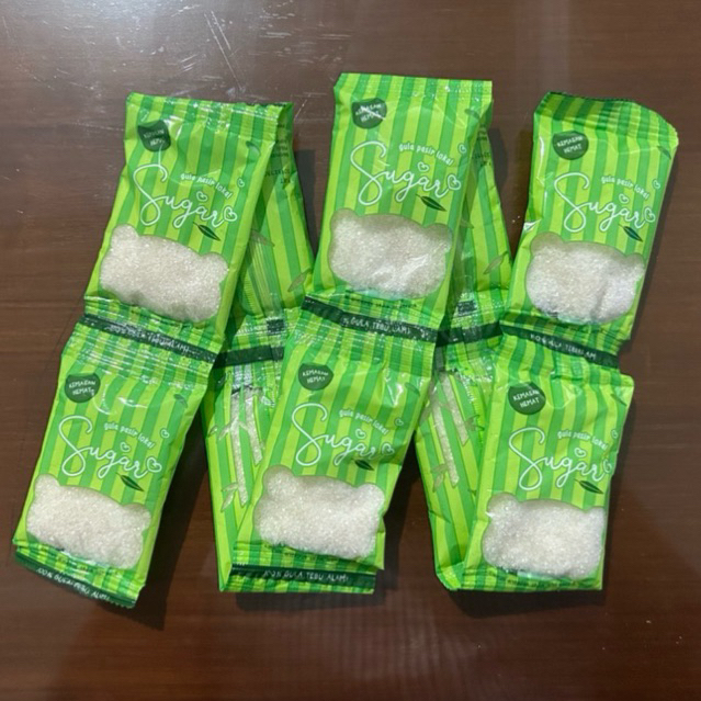 

Gula Kemasan Hemat 1 Renteng is 10 Sachet Merek Sugar / Gula Premium Pasir Putih 250gr 1/4kg Renceng Kualitas Gulaku Rose Lokal