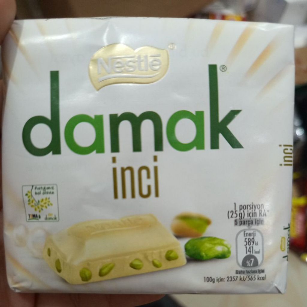 

coklat nestle damak putih full pistachio