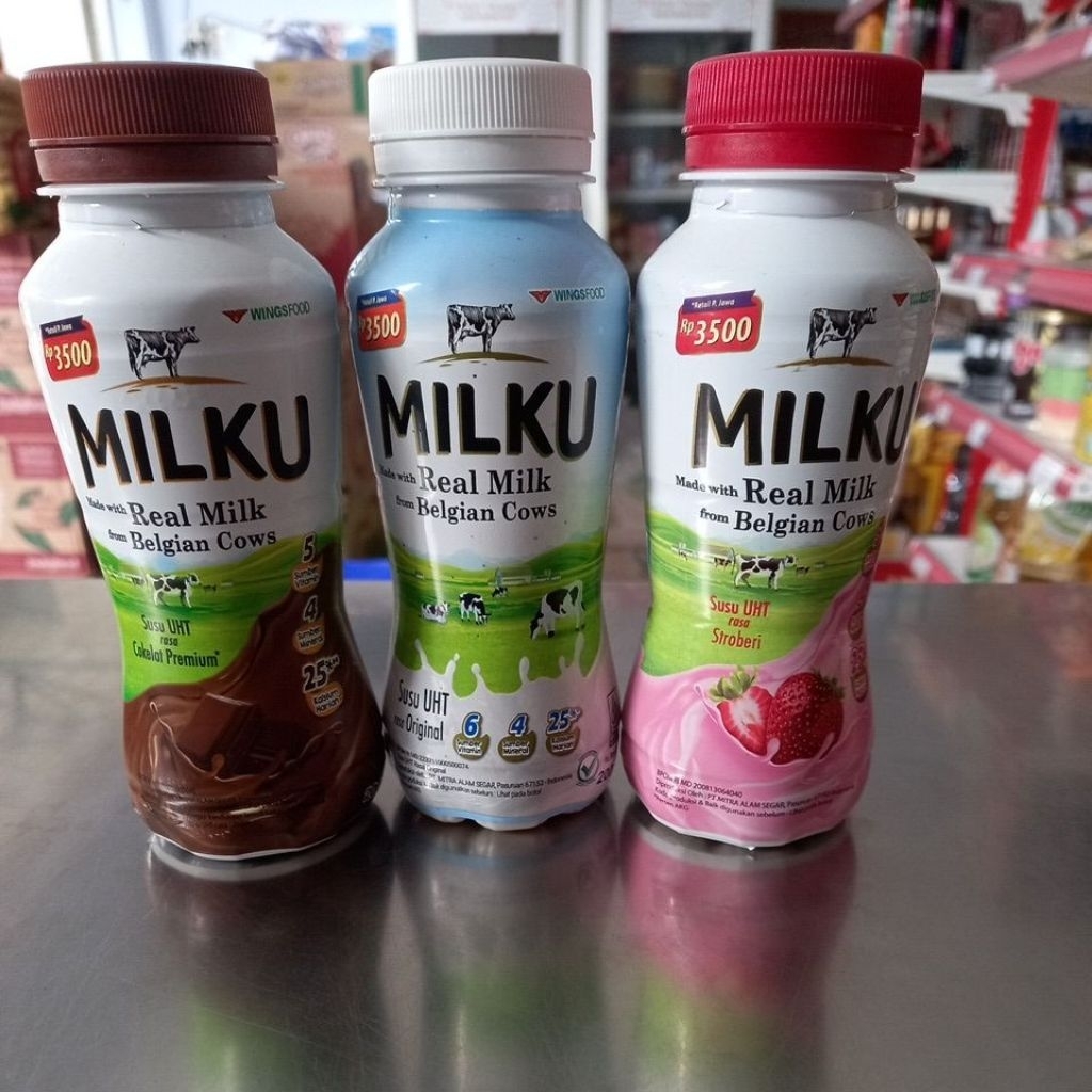 

MILKU REAL MILK BOTOL 200ML STRAWBERRY PLAIN COKLAT