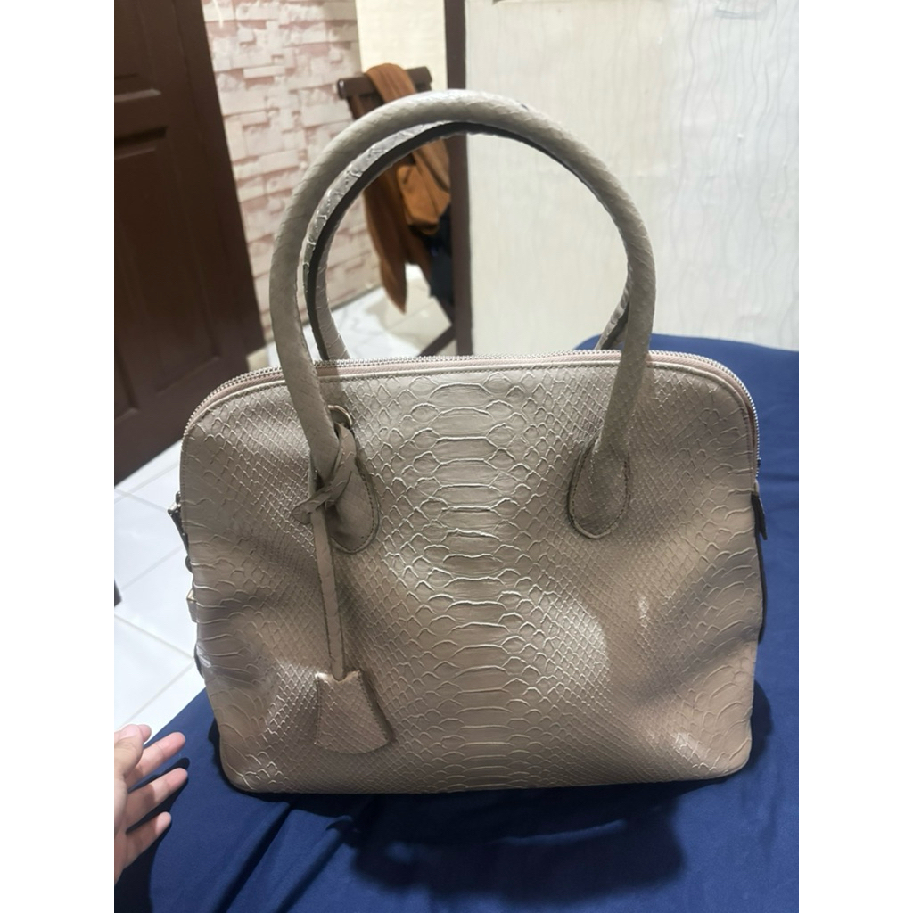 tas kulit ular